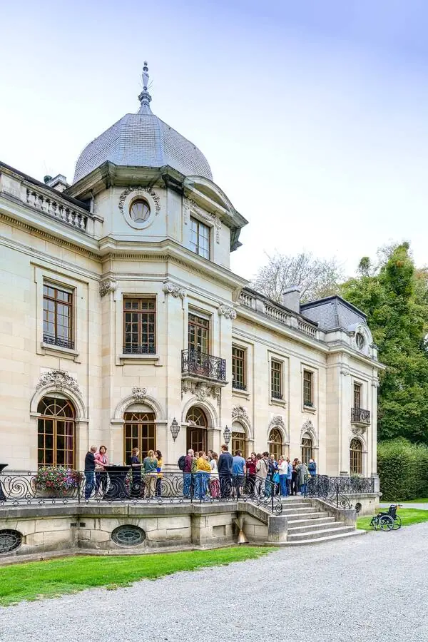 Participants gathered on the château steps
